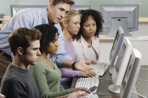 Instructor with Students in Computer Lab